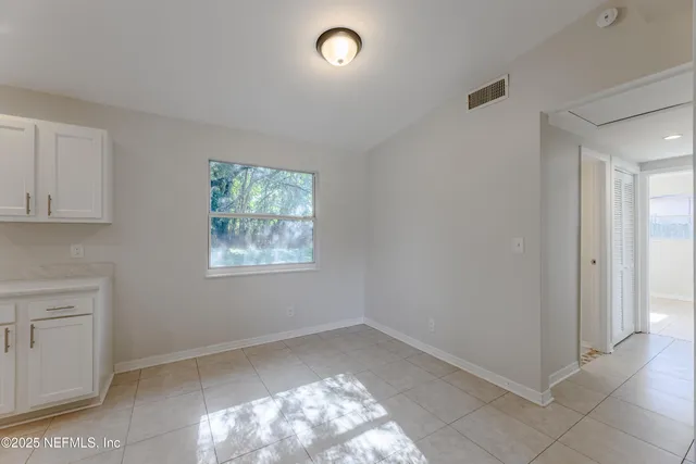 an empty room with windows