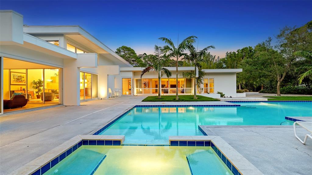 3133 59th Street Sarasota, FL 34243 - Photo 1 of 1 a view of a swimming pool with a yard
