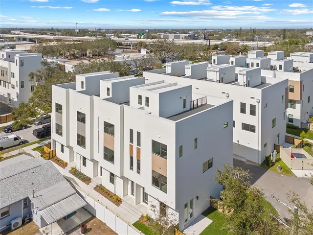 a view of city with tall buildings