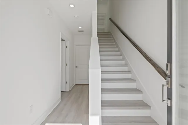 a view of staircase with white walls and white walls