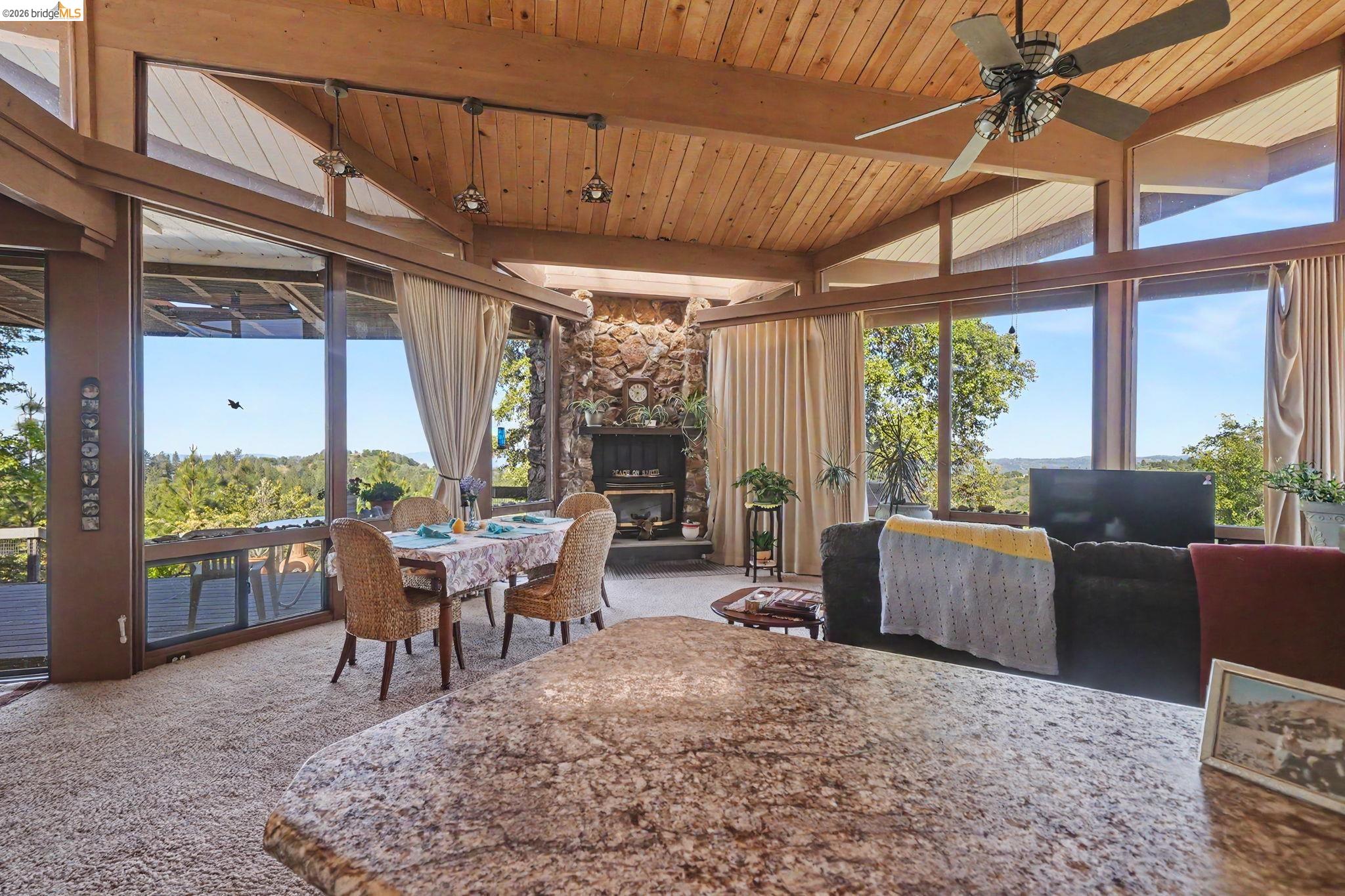 6161 Fullen Road Murphys, CA 95247 - Photo 35 of 53 a view of a dining room with furniture window and outside view