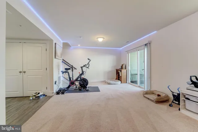 a bed room with a bed and a tv