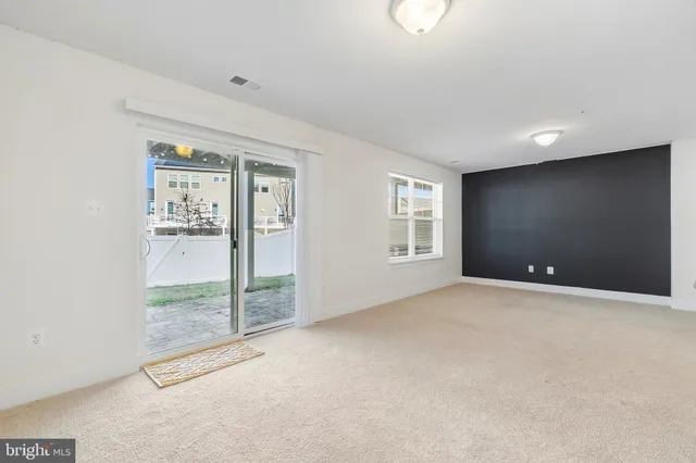 a bathroom with a sink toilet and a mirror