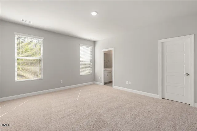 a bathroom with a shower and a bath tub