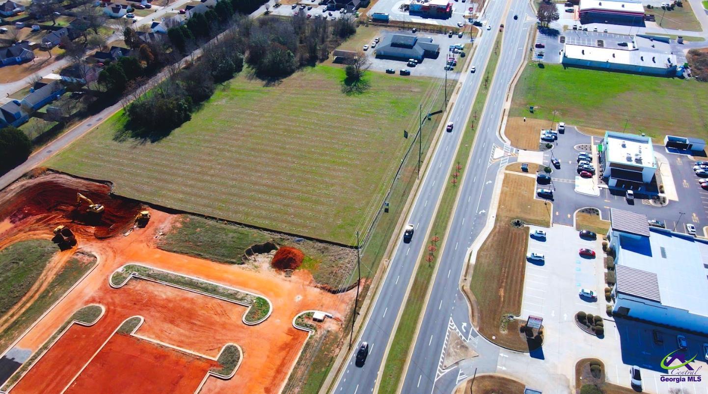 1278 South Houston Lake Road Warner Robins, GA 31088 - Photo 3 of 4 an aerial view of a house with a swimming pool
