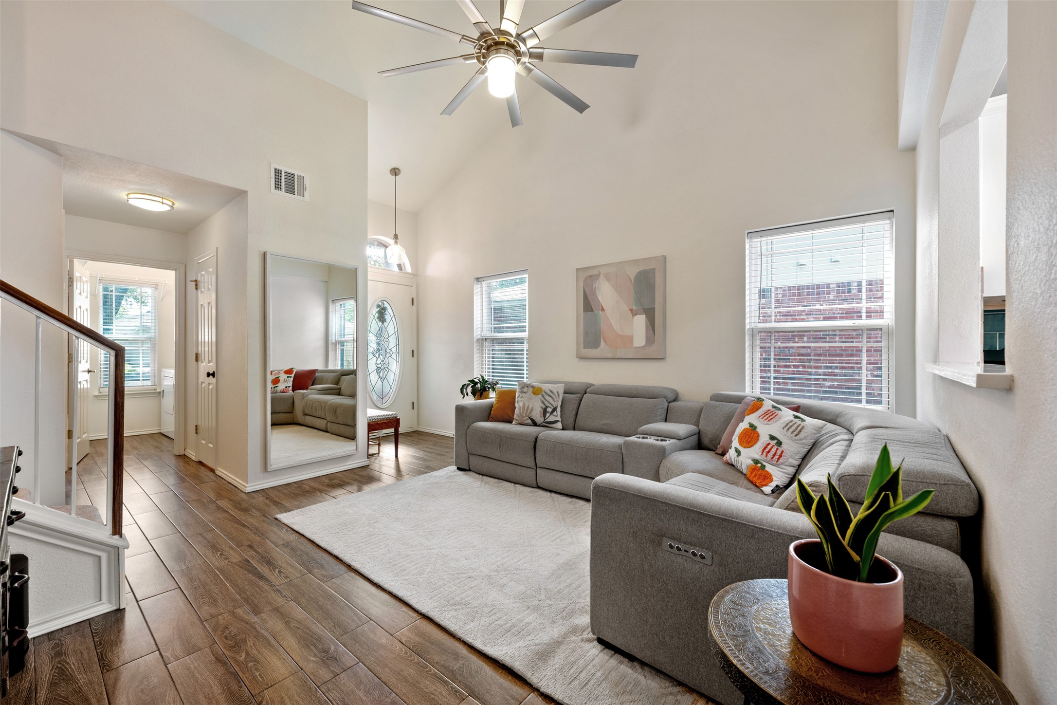 3116 Port Anne Way Leander, TX 78641 - Photo 6 of 24 View of the living room from the primary room hallway.