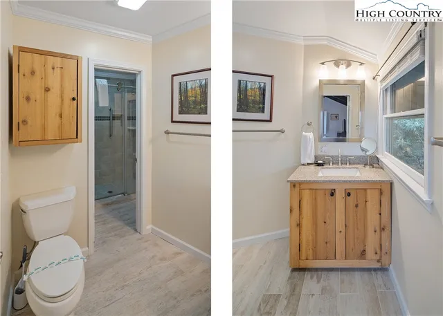 a bathroom with a sink a toilet and mirror