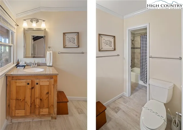 a room with furniture pool table and windows