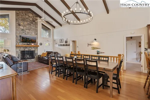 a dining room with furniture and window