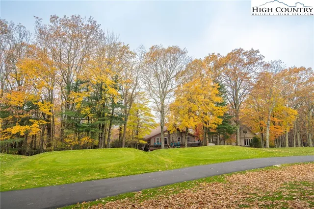 a view of a balcony with wooden fence