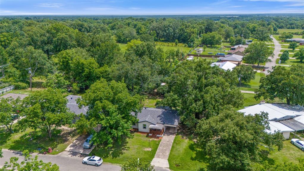 121 Circle Drive Bogata, TX 75417 - Photo 14 of 14 an aerial view of a house with yard
