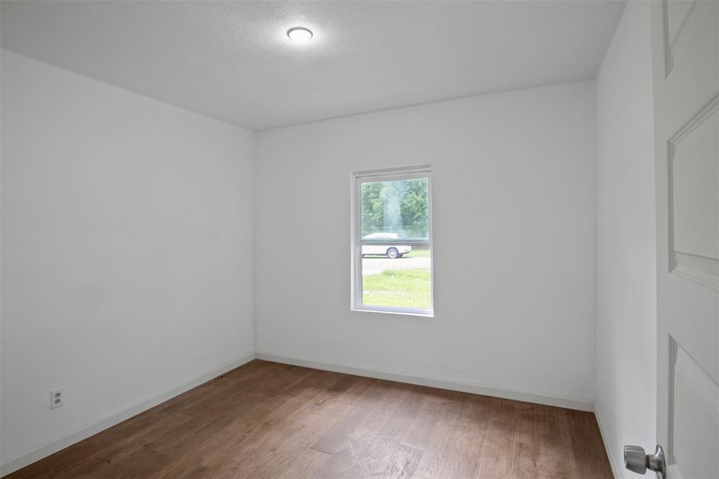 121 Circle Drive Bogata, TX 75417 - Photo 7 of 14 an empty room with a window
