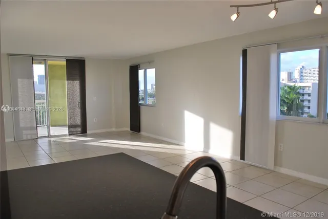 a view of a lake with a building in front of it