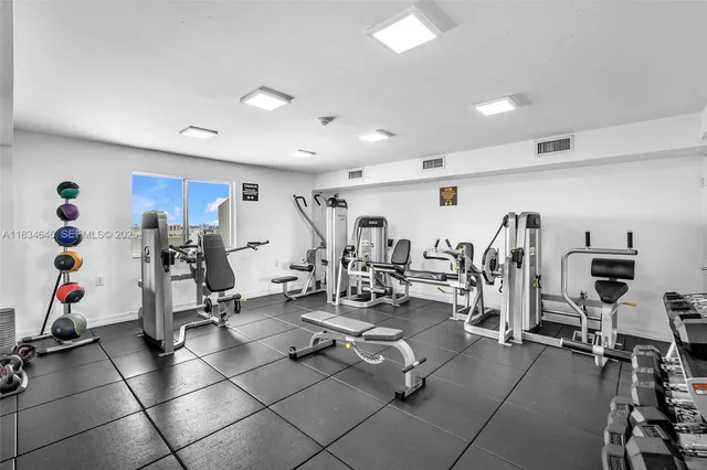 a view of a room with white walls