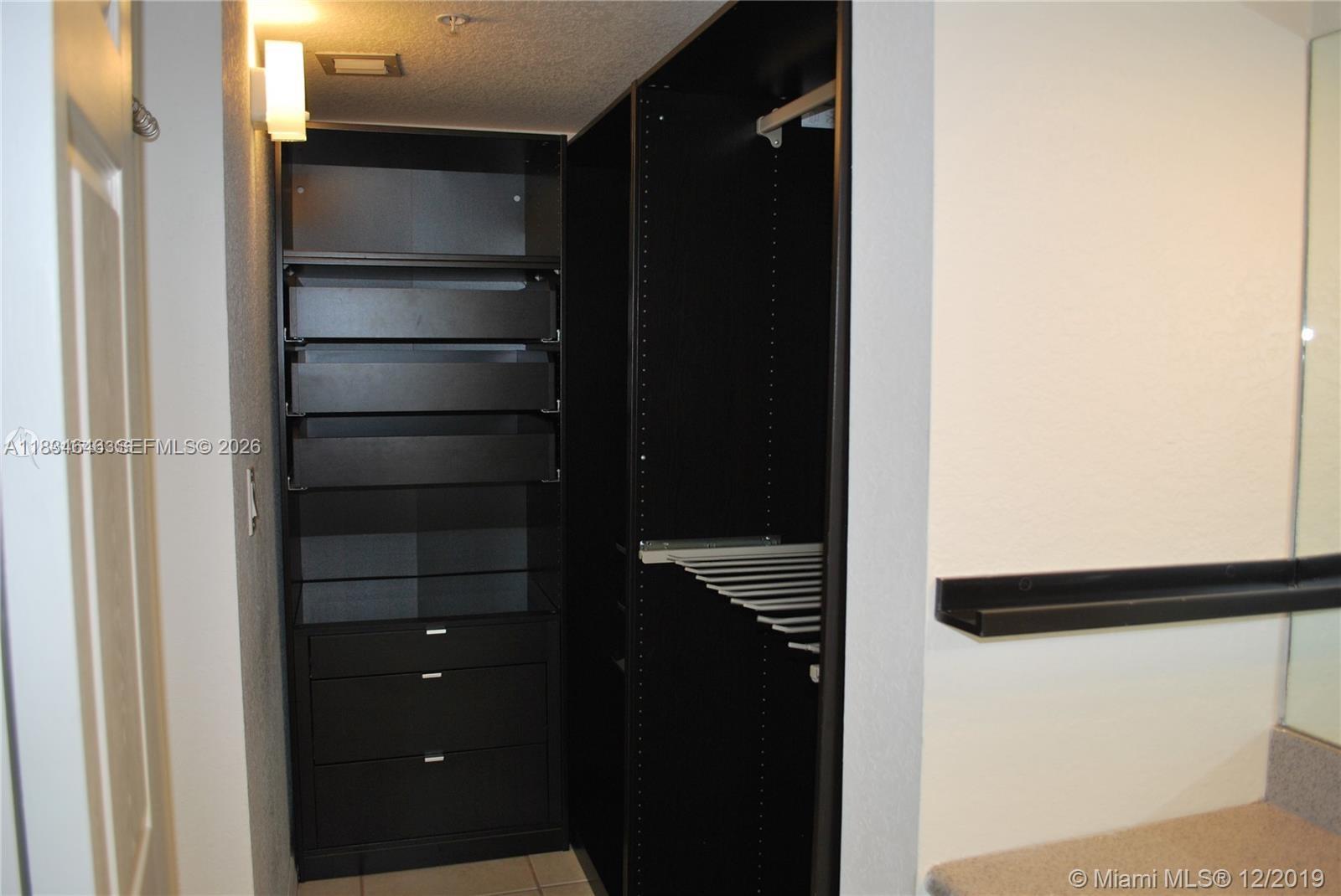 816 Northwest 11th Street, Unit 801 Miami, FL 33136 - Photo 10 of 51 a view of walk in closet