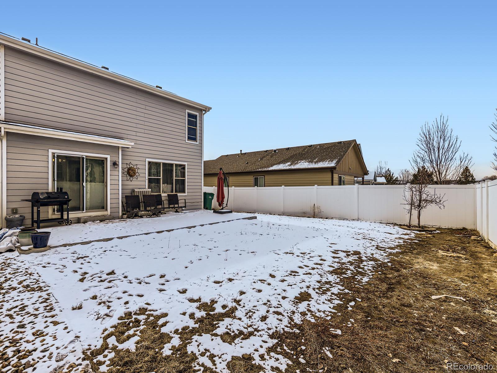 3505 Willow Drive Evans, CO 80620 - Photo 26 of 28 a bedroom with a bed and a couch