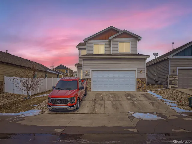 a car parked in front of a house