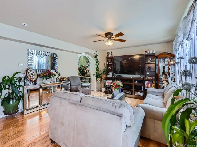 a kitchen with a refrigerator a stove and a sink