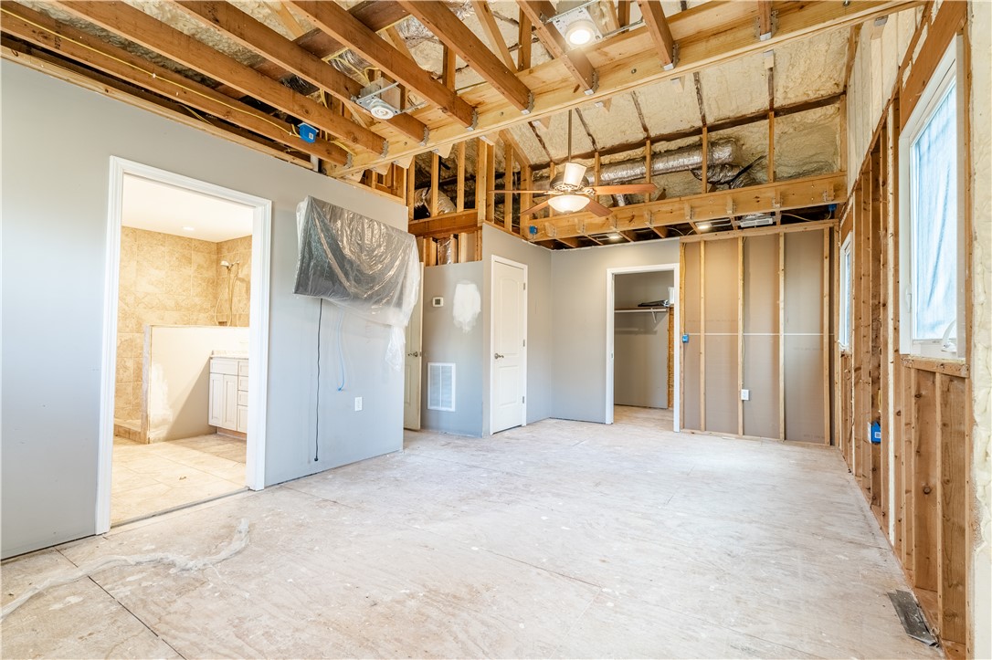 309 Woodland Way Clemson, SC 29631 - Photo 12 of 34 Primary bedroom with walk-in closet and en suite bath.