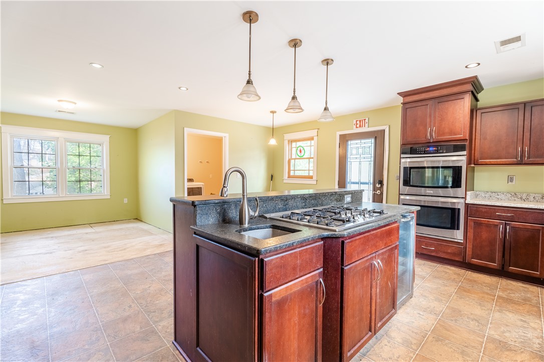 309 Woodland Way Clemson, SC 29631 - Photo 4 of 34 Large breakfast area or entertaining space off kitchen