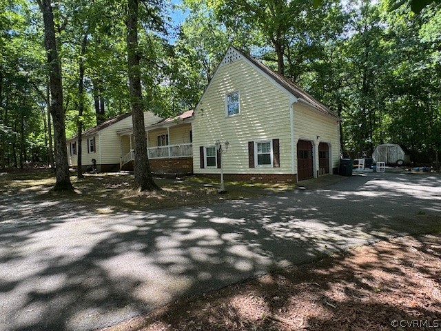 4910 Fordham Road North Chesterfield, VA 23236 - Photo 2 of 3 a view of a house with a yard