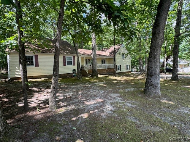 4910 Fordham Road North Chesterfield, VA 23236 - Photo 3 of 3 a view of a house with a tree in the yard