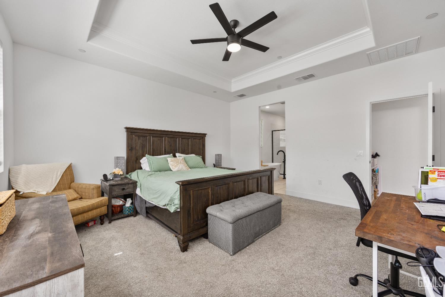 Undisclosed Address Tehachapi, CA 93561 - Photo 26 of 49 a bed room with a bed and a chair