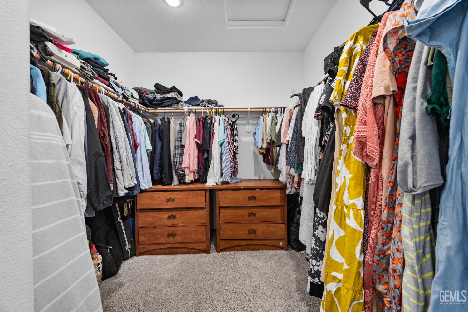 Undisclosed Address Tehachapi, CA 93561 - Photo 31 of 49 a view of walk in closet with clothes