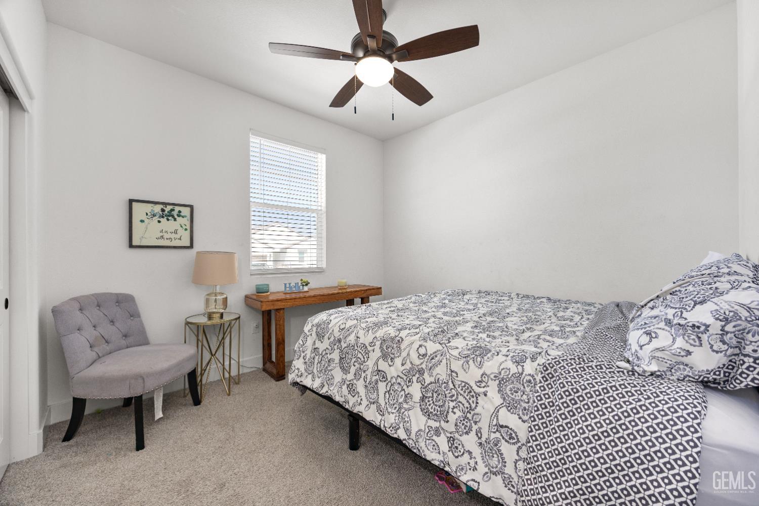 Undisclosed Address Tehachapi, CA 93561 - Photo 32 of 49 a bedroom with a bed and a couch