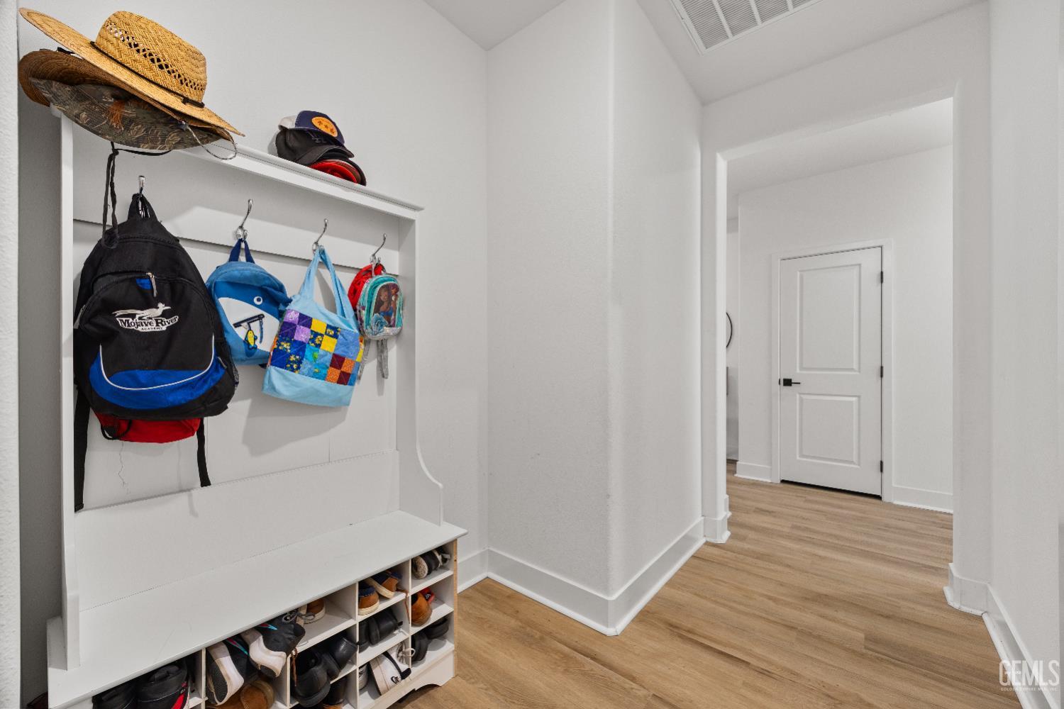 Undisclosed Address Tehachapi, CA 93561 - Photo 35 of 49 a view of an entryway with wooden floor