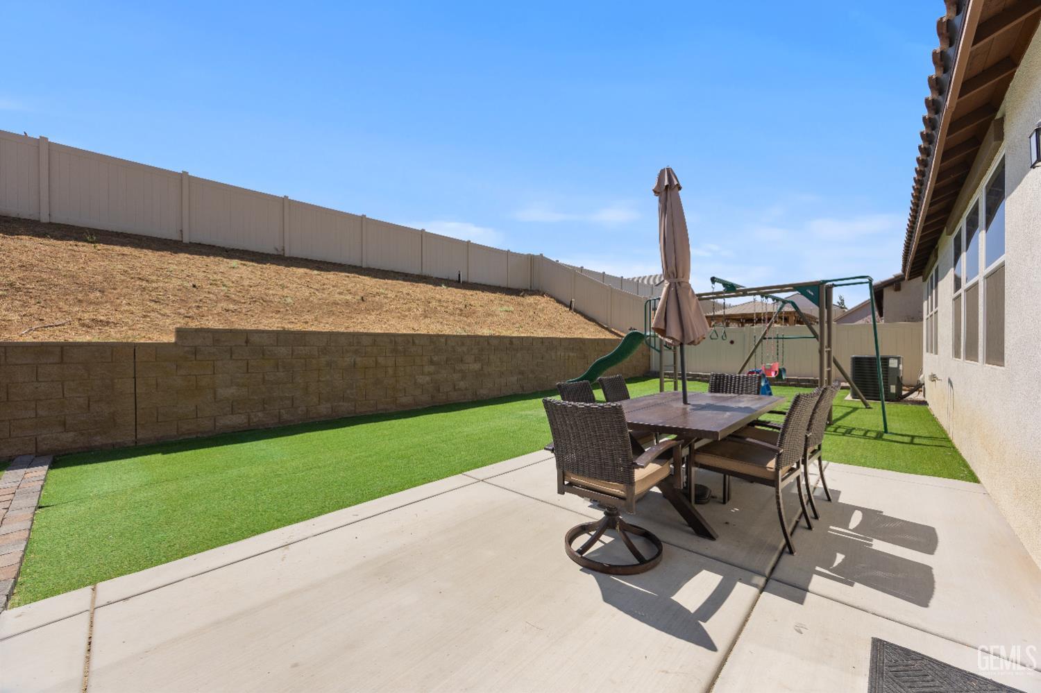 Undisclosed Address Tehachapi, CA 93561 - Photo 41 of 49 a view of a patio with a table and chairs