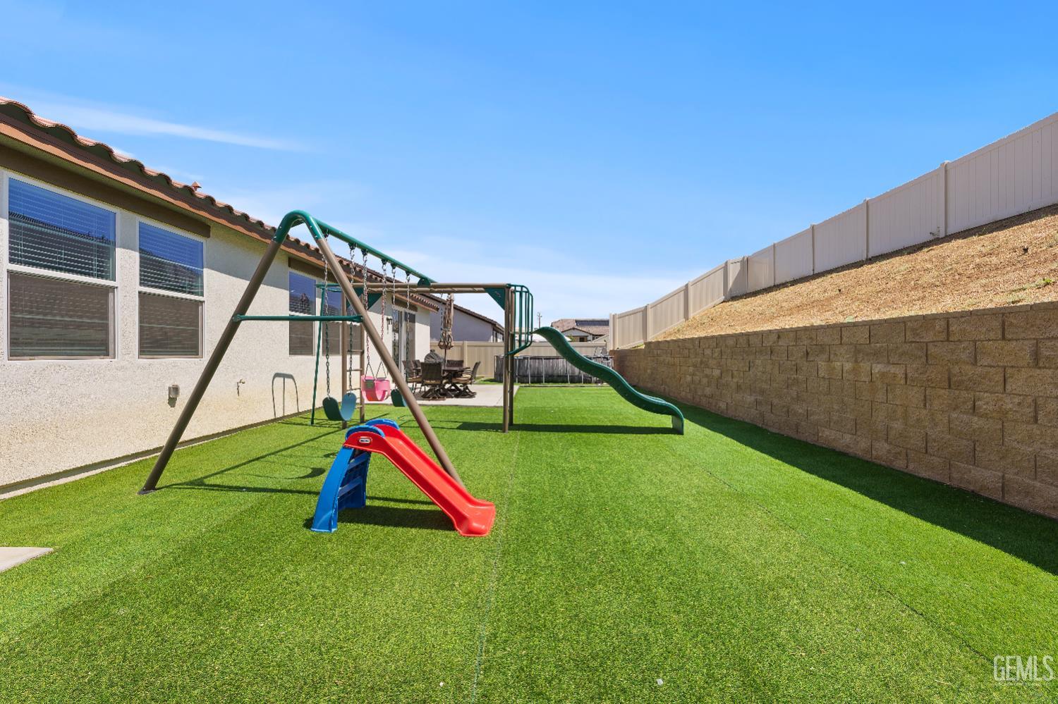 Undisclosed Address Tehachapi, CA 93561 - Photo 43 of 49 a view of a backyard with a slide