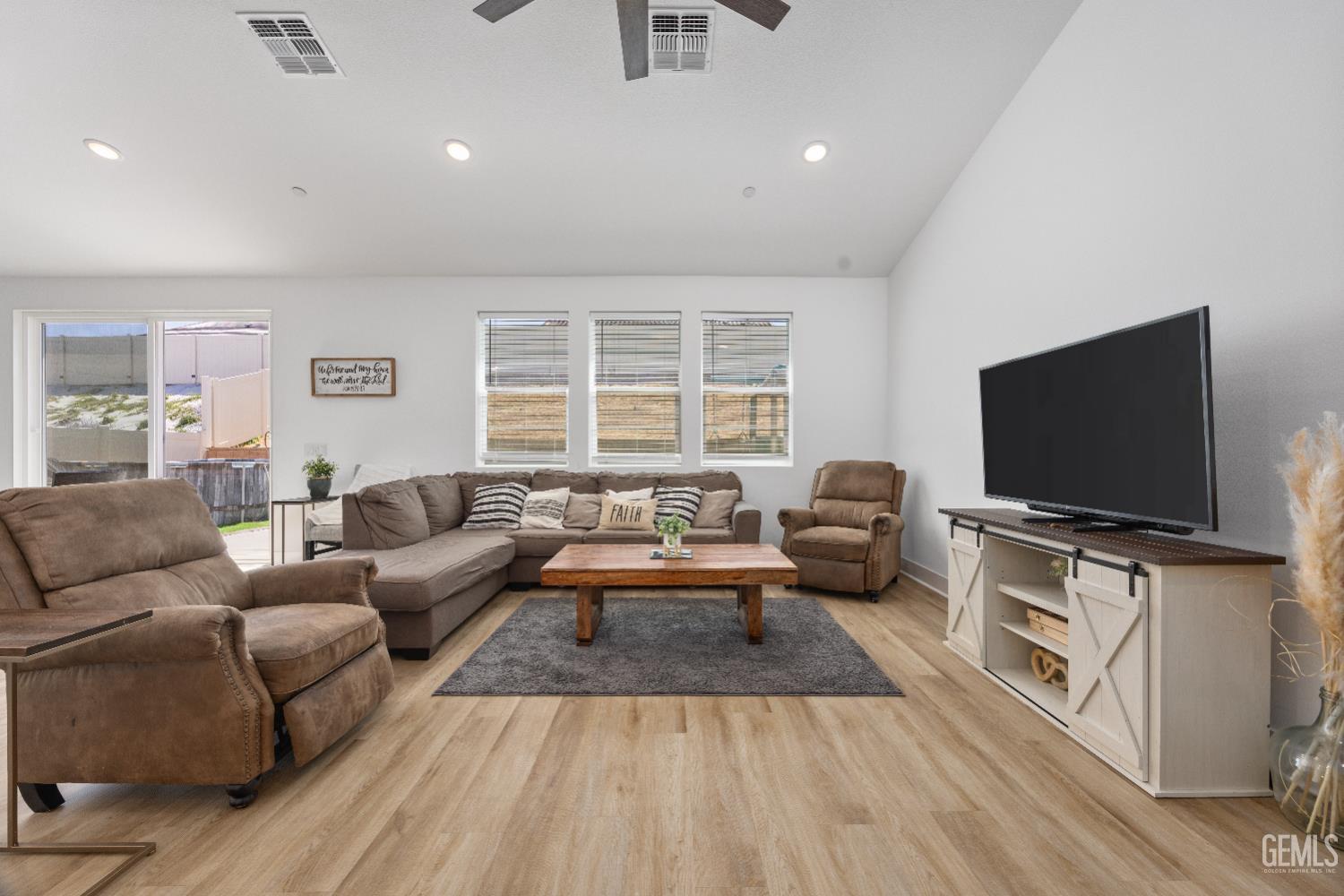 Undisclosed Address Tehachapi, CA 93561 - Photo 8 of 49 a living room with furniture and a flat screen tv