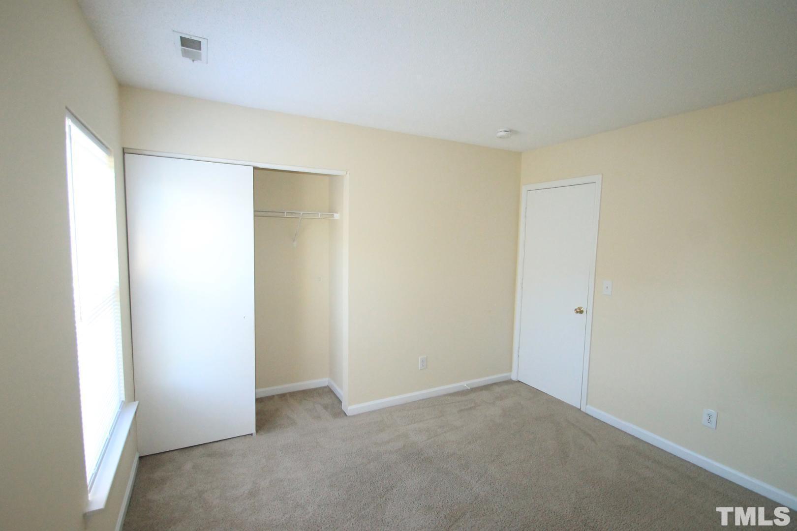 408 Pebblestone Drive Durham, NC 27703 - Photo 14 of 27 a view of an empty room