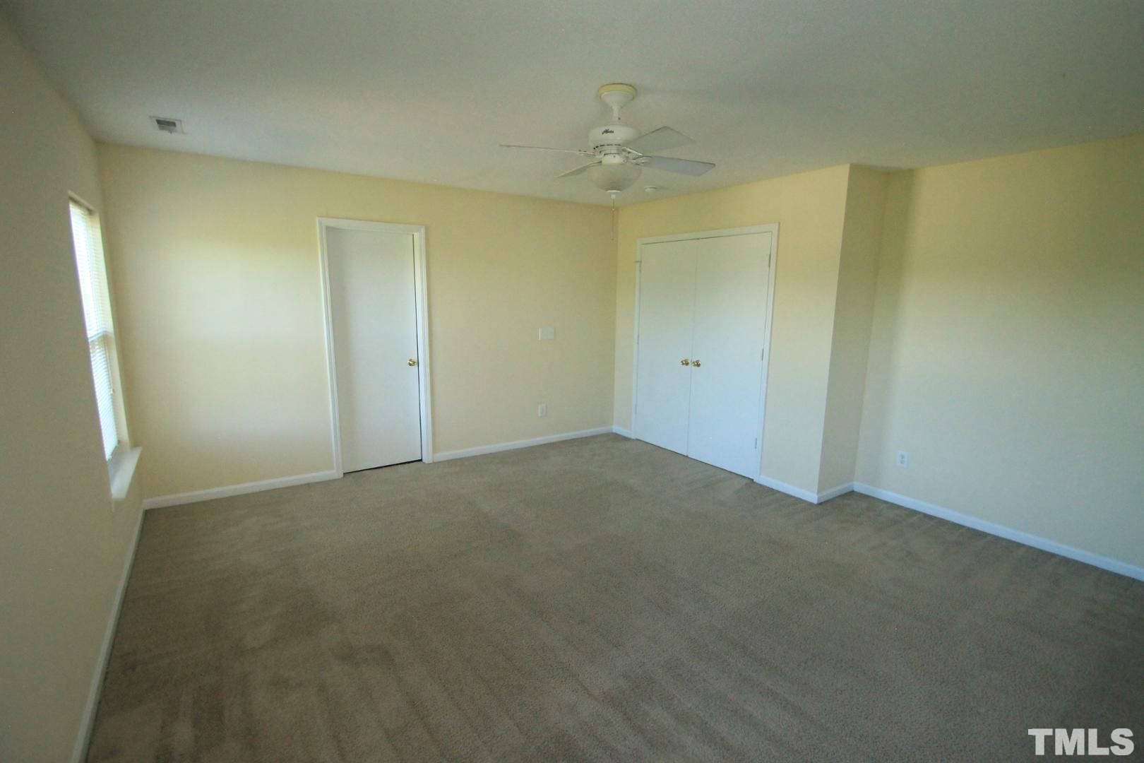408 Pebblestone Drive Durham, NC 27703 - Photo 21 of 27 an empty room with a bathroom
