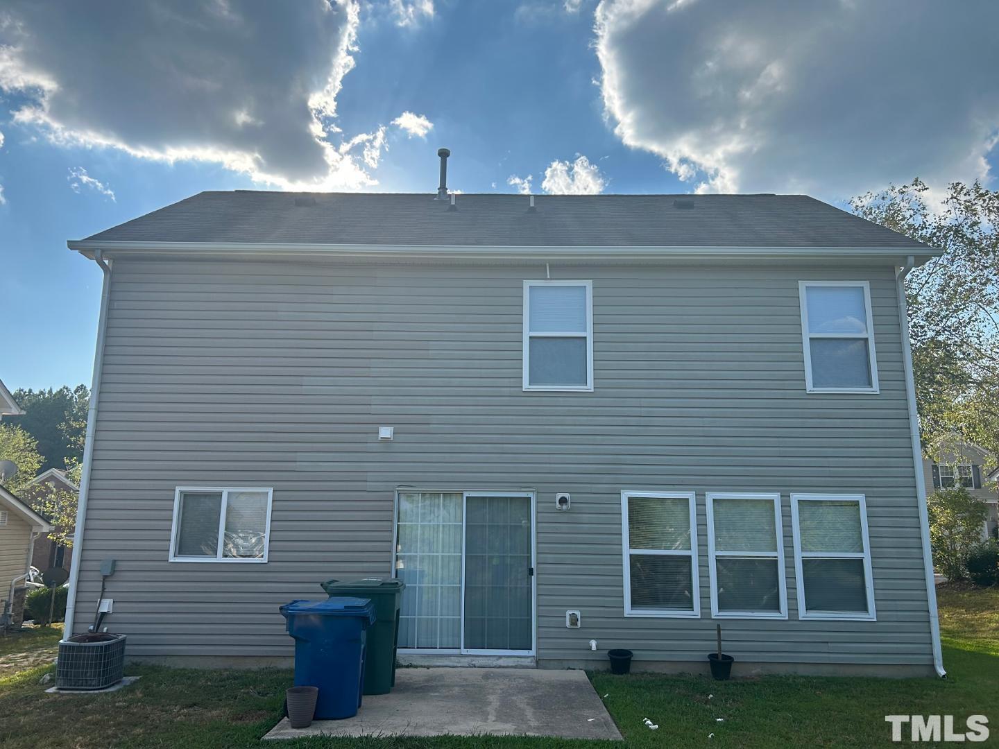 408 Pebblestone Drive Durham, NC 27703 - Photo 3 of 27 a front view of a house with a yard