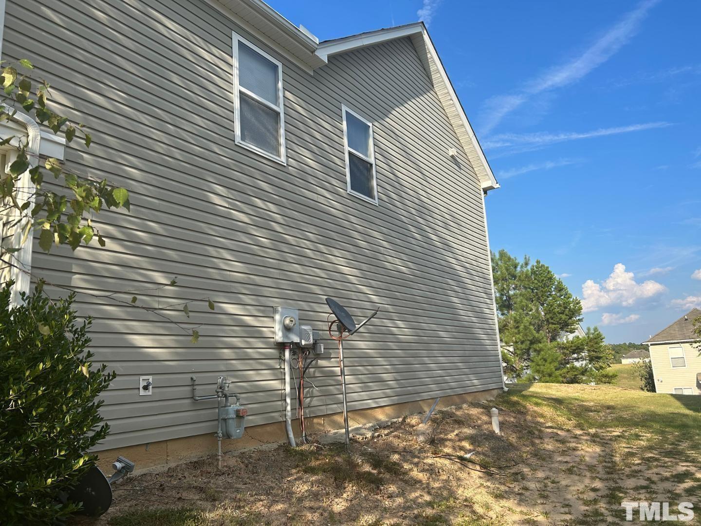 408 Pebblestone Drive Durham, NC 27703 - Photo 4 of 27 a backyard of a house