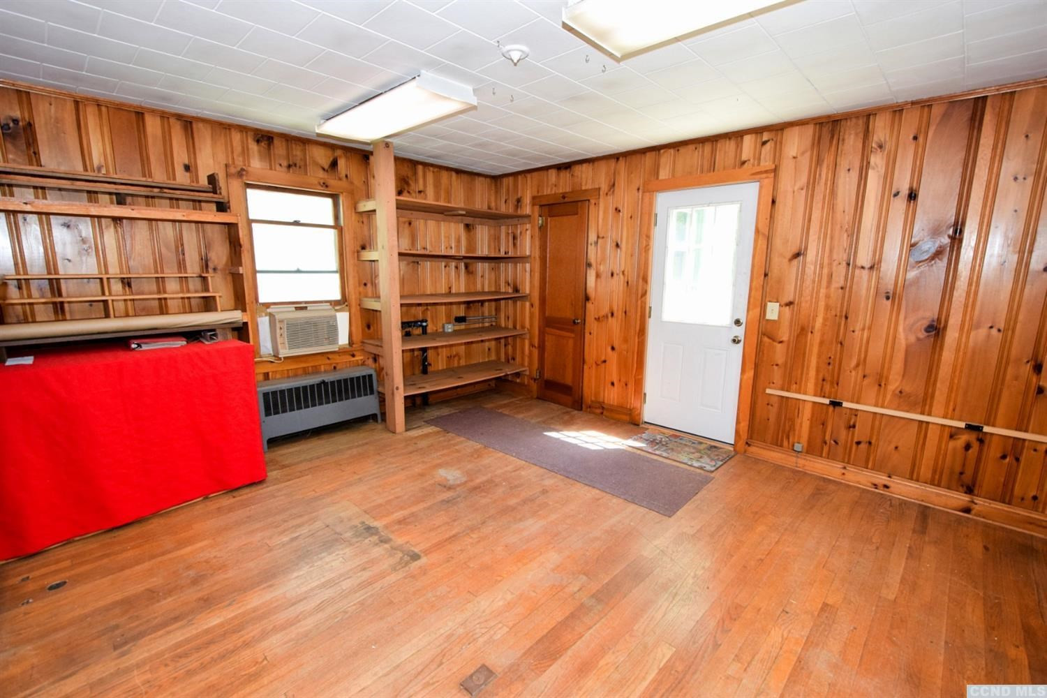 597 Main Street Cairo, NY 12413 - Photo 11 of 23 wooden floor and windows in a room