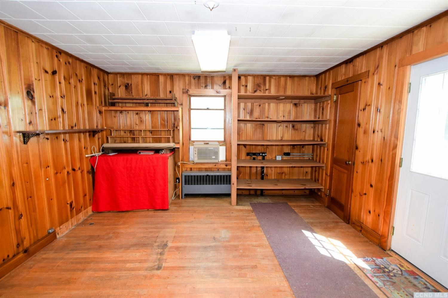 597 Main Street Cairo, NY 12413 - Photo 12 of 23 a view of walk in closet with clothes and shoes