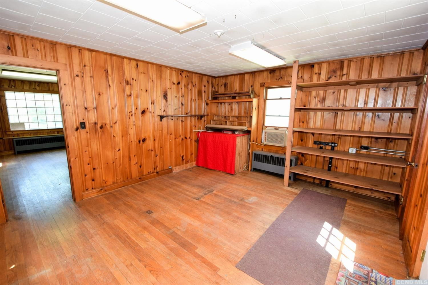 597 Main Street Cairo, NY 12413 - Photo 13 of 23 a view of an empty room with a window