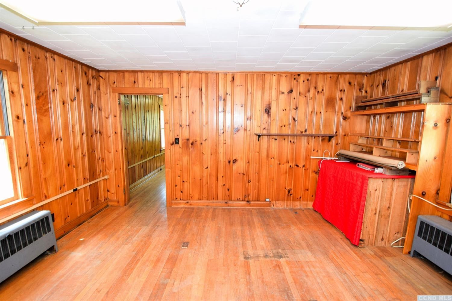 597 Main Street Cairo, NY 12413 - Photo 14 of 23 a view of front door with wooden floor and furniture