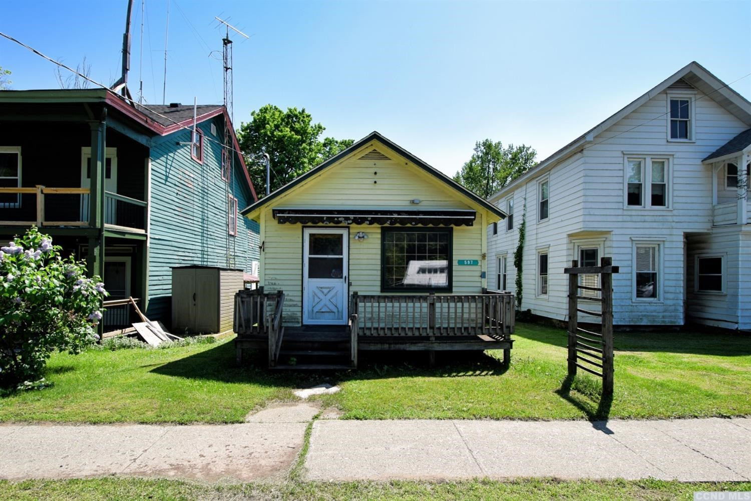 597 Main Street Cairo, NY 12413 - Photo 20 of 23 a front view of a house with a yard