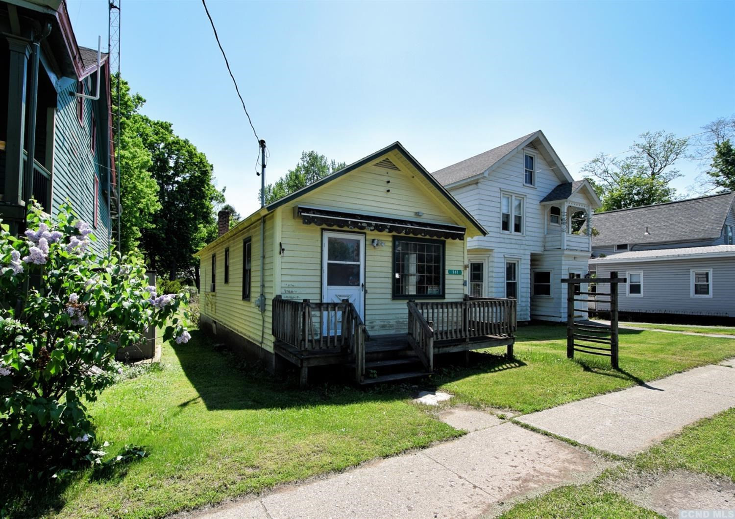597 Main Street Cairo, NY 12413 - Photo 21 of 23 a view of a house with a backyard and porch
