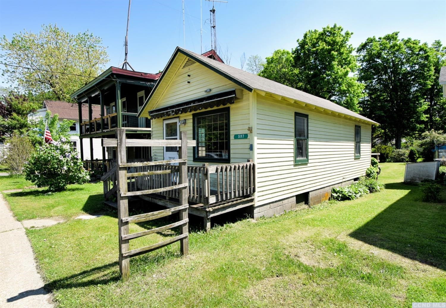 597 Main Street Cairo, NY 12413 - Photo 3 of 23 a view of a house with a yard