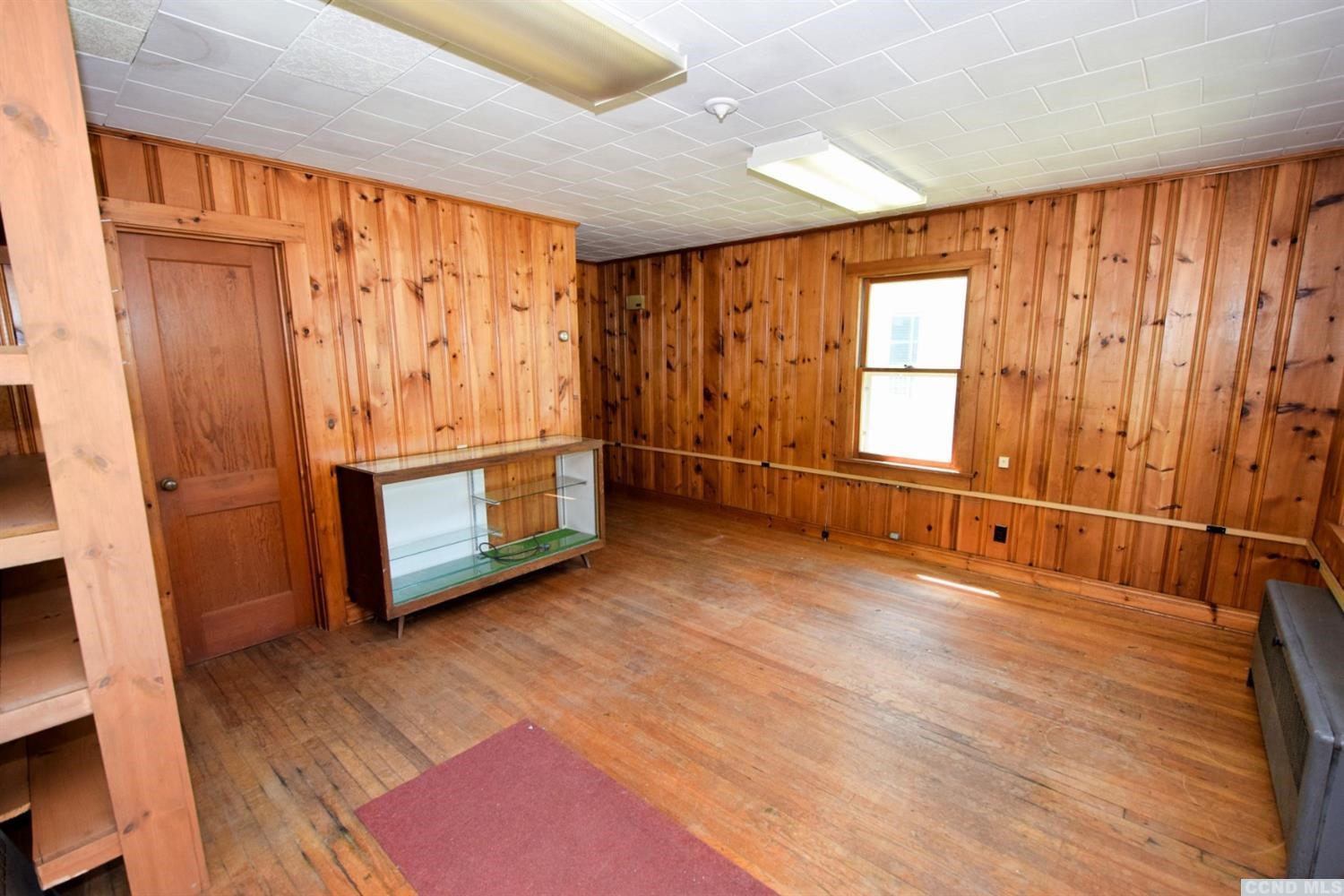 597 Main Street Cairo, NY 12413 - Photo 4 of 23 a view of an empty room with a window