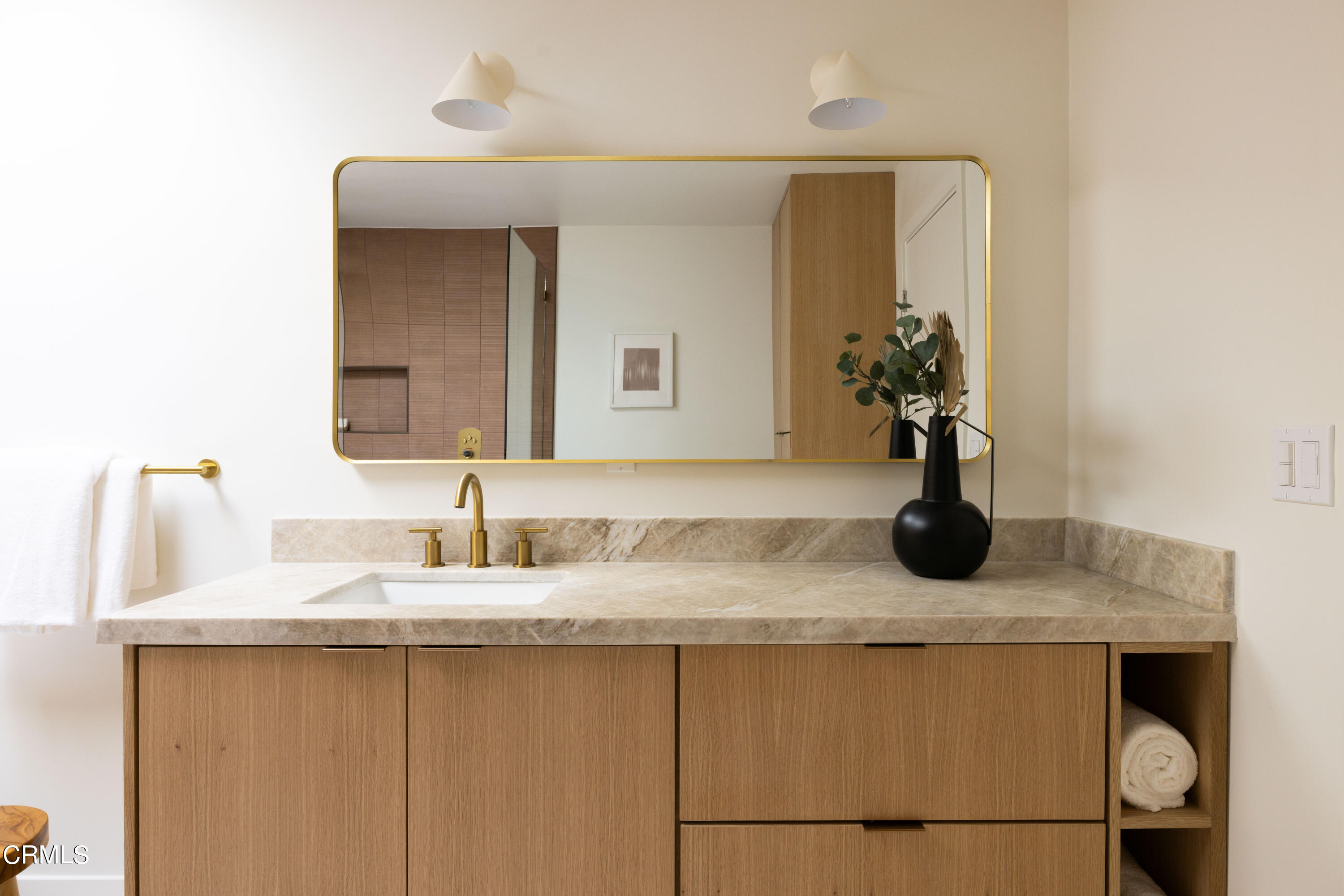 1054 Rutland Avenue Los Angeles, CA 90042 - Photo 15 of 27 a bathroom with a granite countertop sink and a mirror