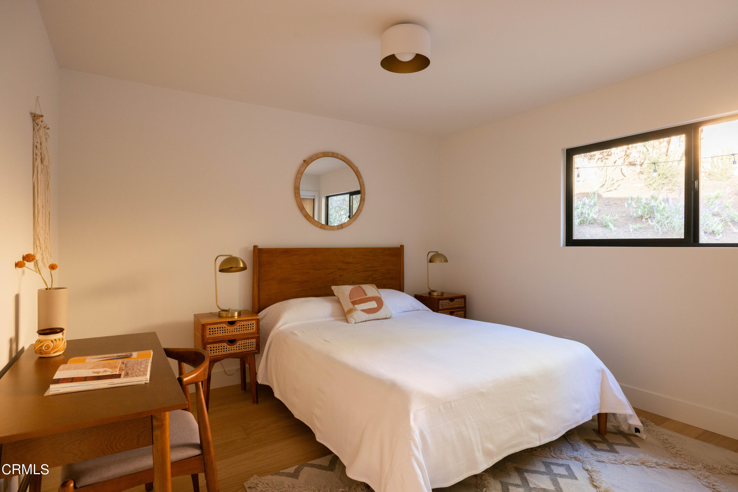 1054 Rutland Avenue Los Angeles, CA 90042 - Photo 20 of 27 a bedroom with a bed and a desk