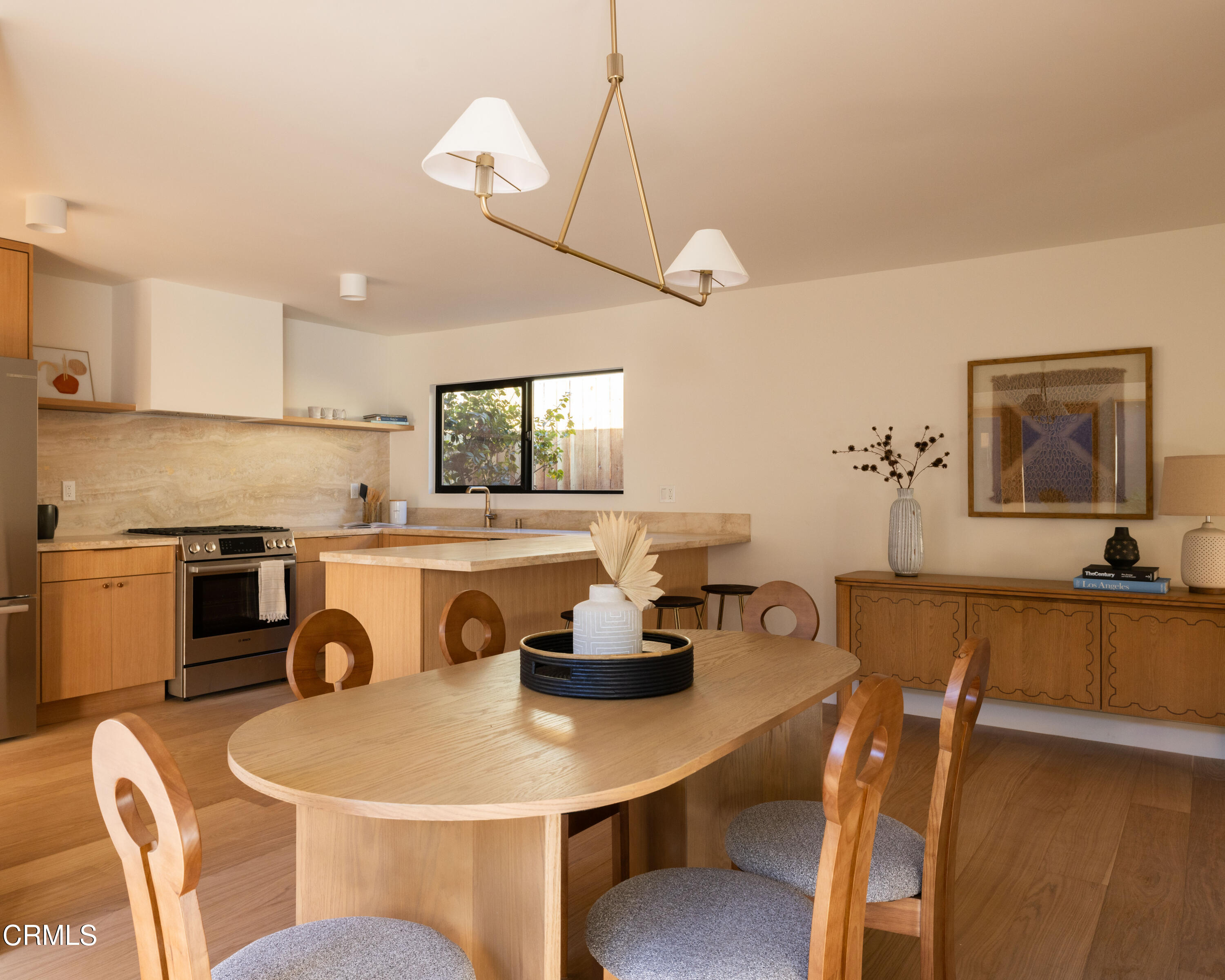 1054 Rutland Avenue Los Angeles, CA 90042 - Photo 9 of 27 a dining room with furniture and window