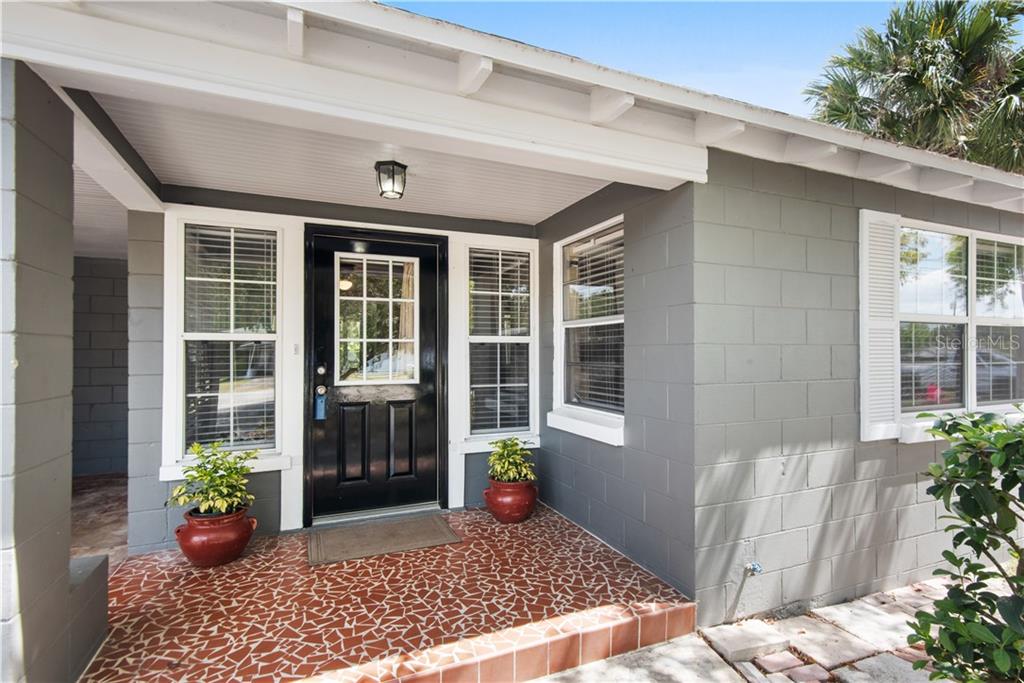 209 Margarita Road DeBary, FL 32713 - Photo 1 of 1 a view of a house with potted plants