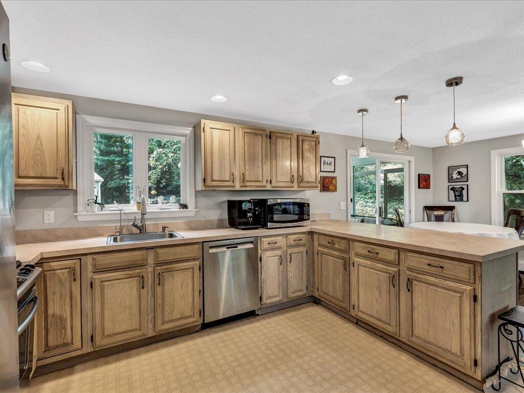25 Moon Compass Lane Sandwich, MA 02563 - Photo 20 of 55 a kitchen with sink and window